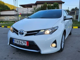 Toyota Auris 1.8 HYBRID/NAVIG/AVTOMAT/TOP SUSTOQNIE, снимка 1