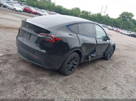 Tesla Model Y U U All Wheel Drive - 37300 лв. - 29404315 11