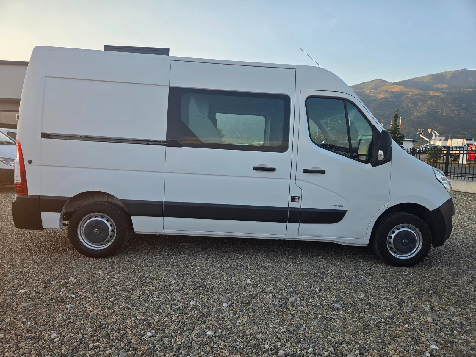 Opel Movano 2.3d 125k.c 7 места Климатик, снимка 7 - Бусове и автобуси - 55326975
