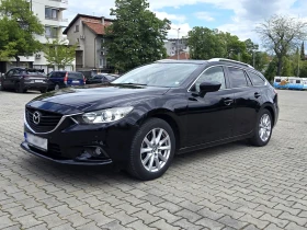 ������ Mazda 6