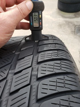 Гуми Зимни 315/40R21, снимка 8