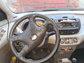 Nissan Almera tino, снимка 9