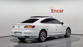 VW Arteon 2.0 TDI* BLIND SPOT* МАСАЖ* ЕЛ. БАГАЖНИК* ЛЮК* КРА, снимка 2