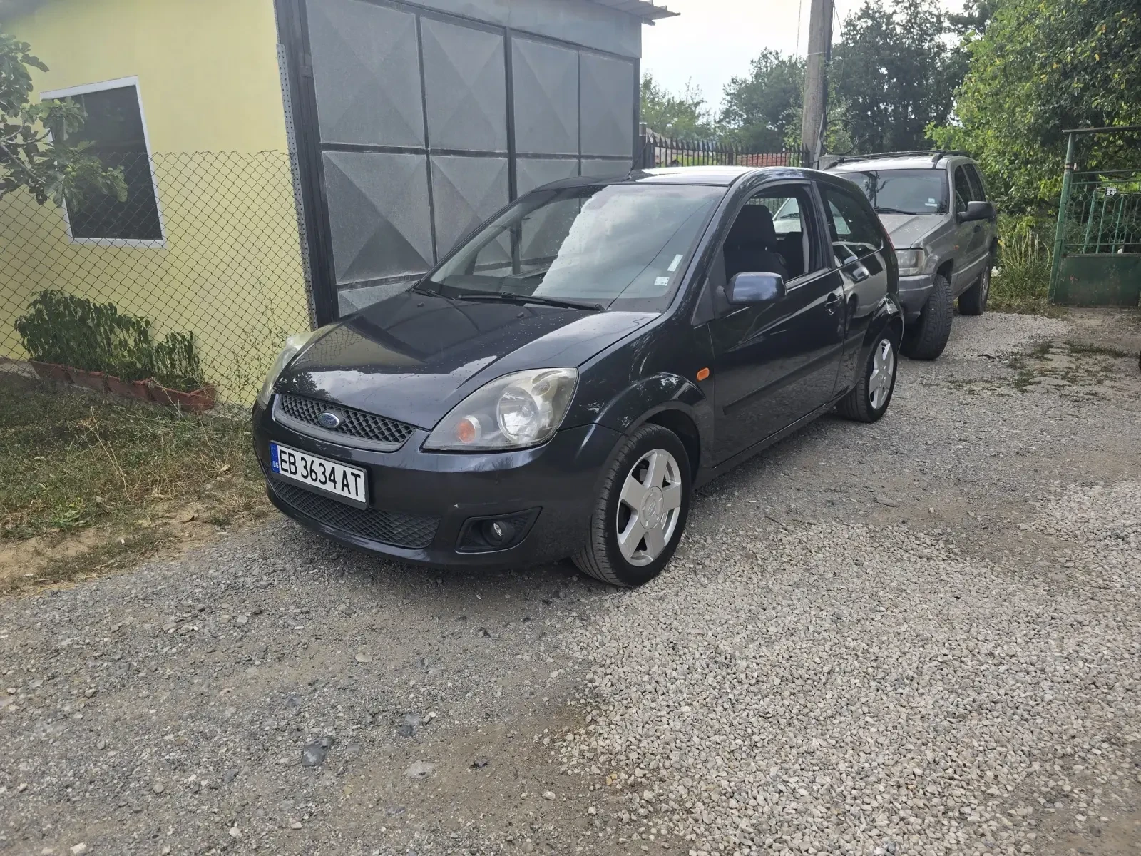 Ford Fiesta 1.4i 80кс КЛИМАТИК, снимка 14 - Автомобили и джипове - 53852996
