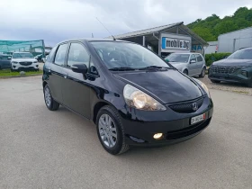 Honda Jazz 1.4i-84кс-ШВЕЙЦАРИЯ-АВТОМАТ-FACELIFT, снимка 2