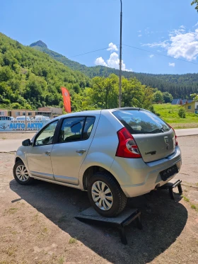 Dacia Sandero 1.4I КЛИМАТИК - 3799 лв. - 11905595 6