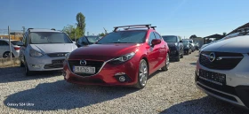 ������ Mazda 3