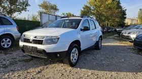 Dacia Duster 1.6i-4x4 ФБ. ГАЗОВО- 6ск., снимка 1