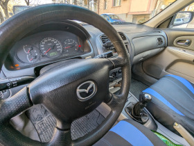Mazda 323, снимка 5 - Автомобили и джипове - 44759807