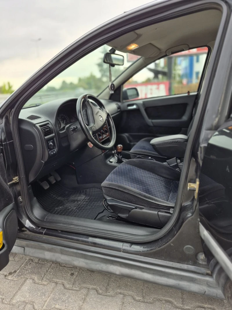 Opel Astra 1.6 Газ/Бензин 101 Коня  , снимка 9 - Автомобили и джипове - 52647023