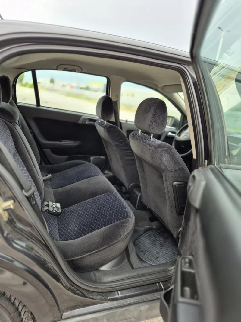Opel Astra 1.6 Газ/Бензин 101 Коня  , снимка 10 - Автомобили и джипове - 52647023