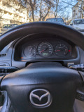 Mazda 323  - изображение 7