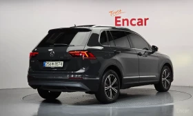 VW Tiguan ПОДГРЕВ* ПАНО* ДИСТРОНИК* HEADUP* КАМЕРА* 360*  | Auto.bg — изображение 2