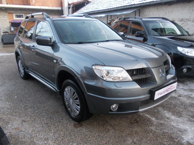 Mitsubishi Outlander 2.04x4-клима, снимка 1 - Автомобили и джипове - 43820495