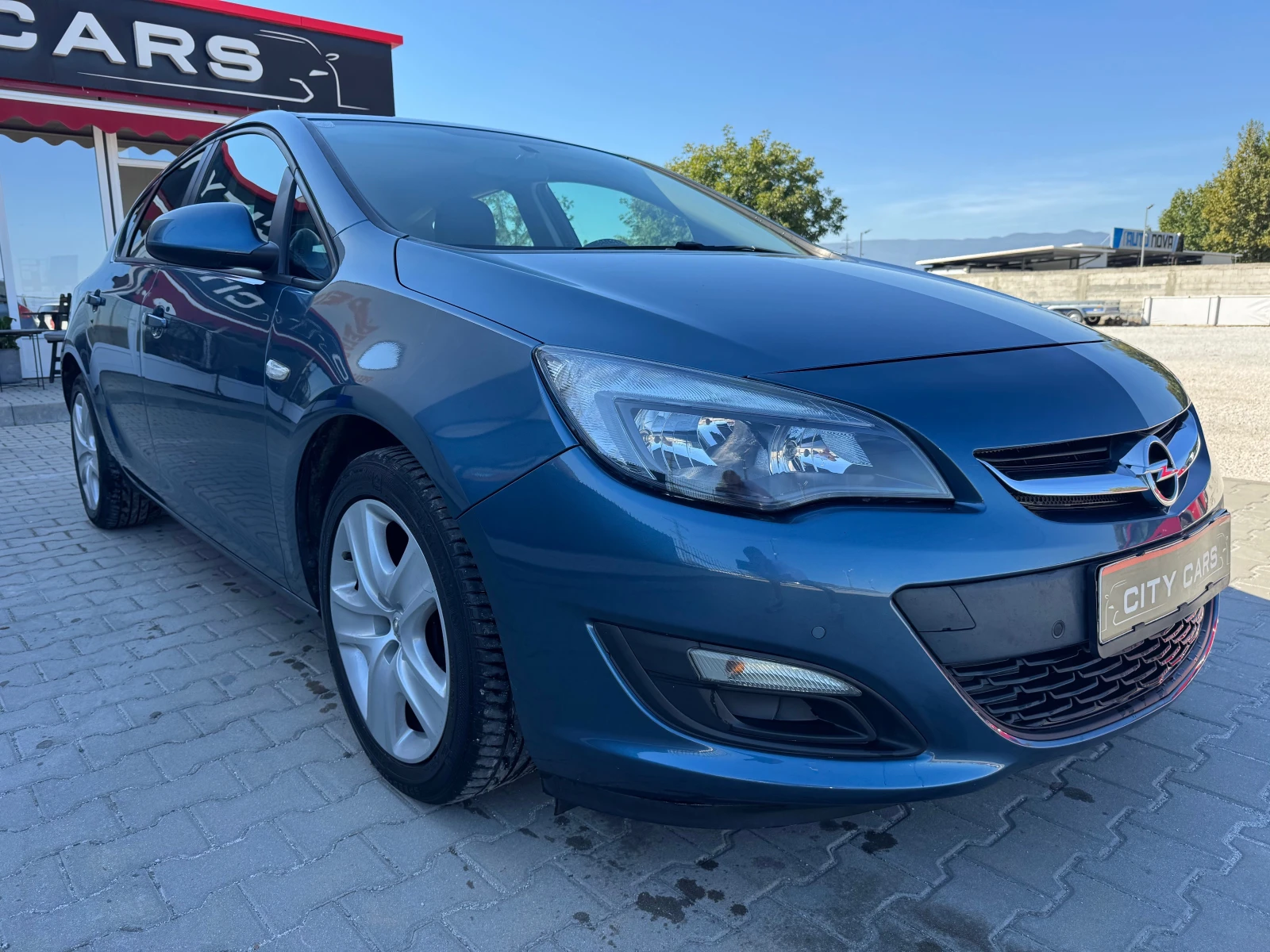 Opel Astra -1.3cdti 2013г - изображение 2