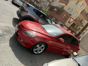 Mazda 3 2.0 i, снимка 14