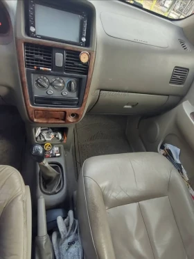 Kia Carens 1.8i, снимка 9