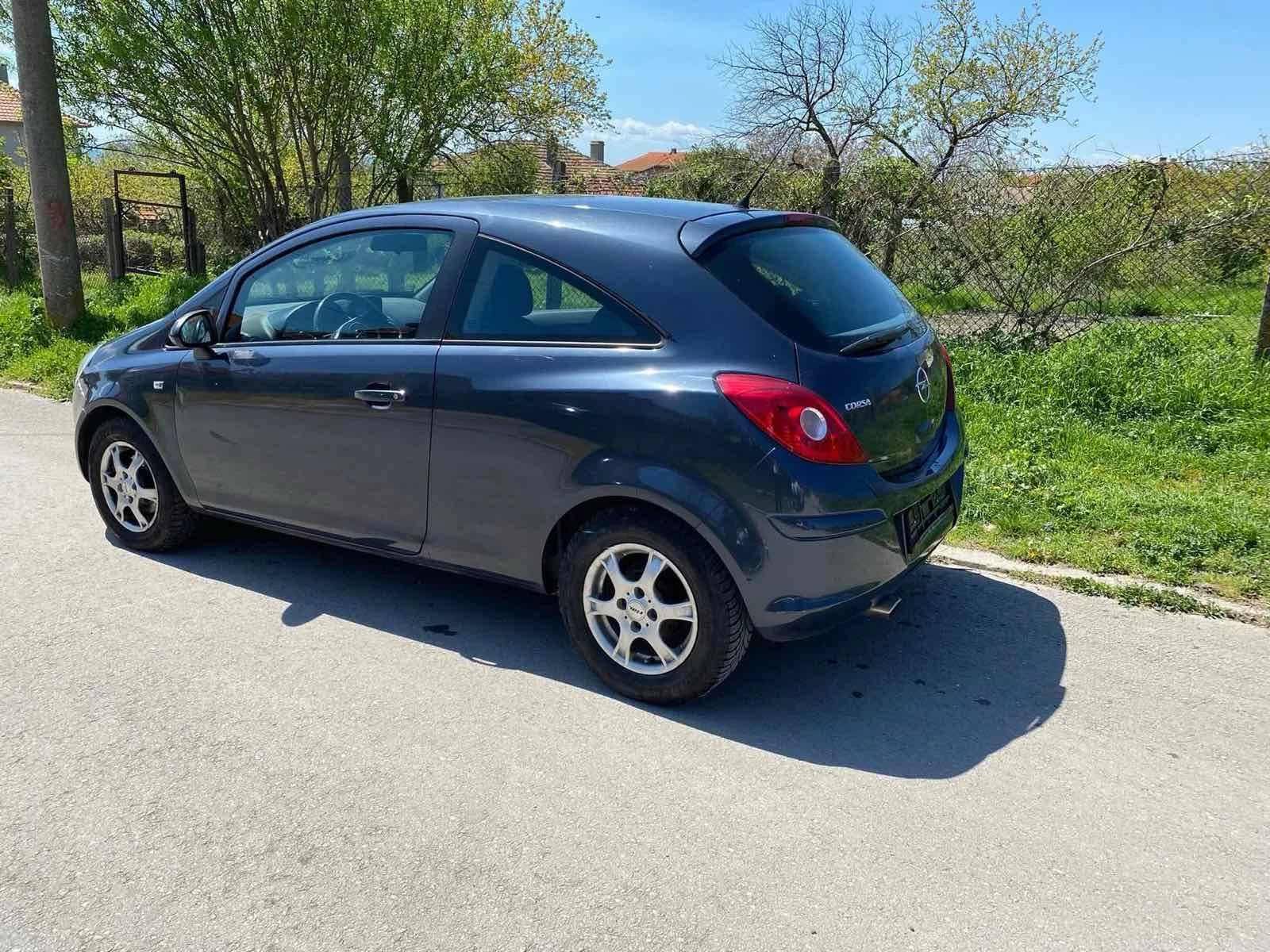 Opel Corsa 1.2i 80hp, снимка 13 - Автомобили и джипове - 56747079