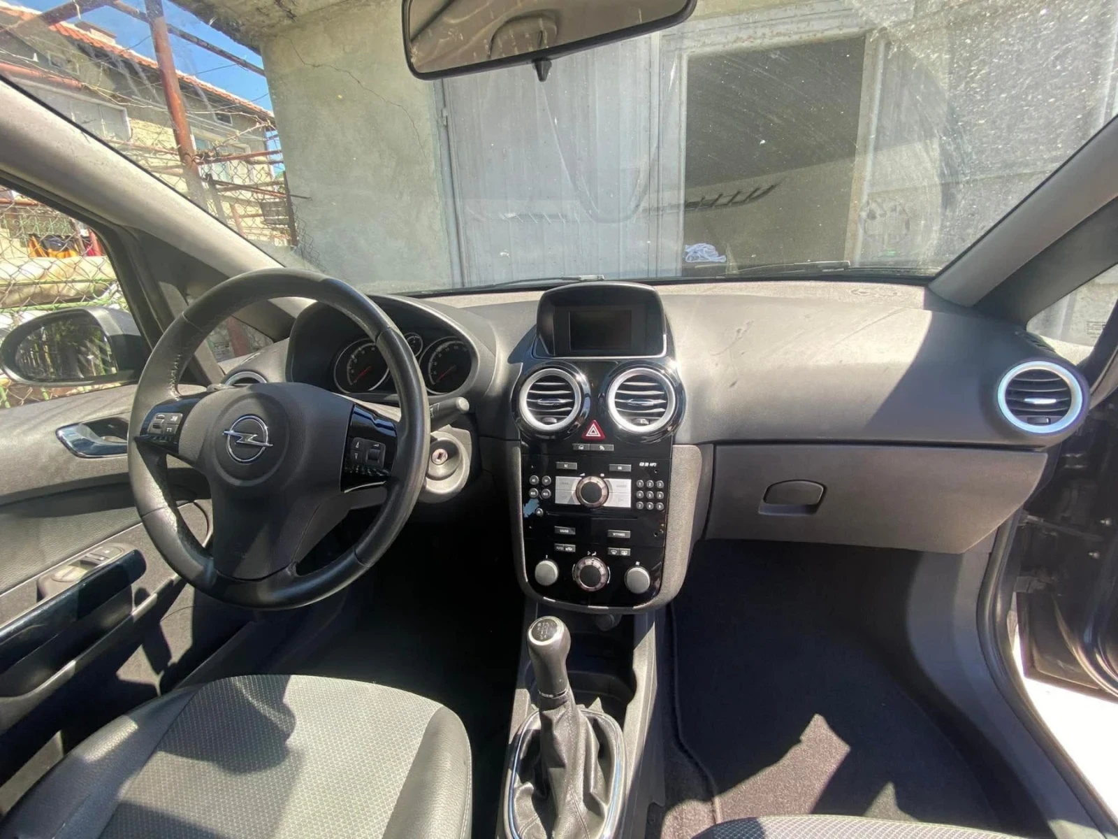 Opel Corsa 1.2i 80hp, снимка 11 - Автомобили и джипове - 56747079