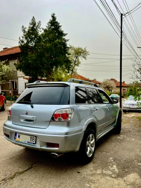 Mitsubishi Outlander 2.4i/НОВИ ЗИМНИ ГУМИ/LPG/АВТОМАТ, снимка 10