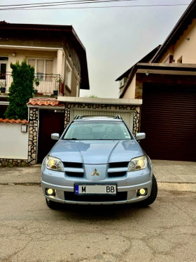Mitsubishi Outlander 2.4i/НОВИ ЗИМНИ ГУМИ/LPG/АВТОМАТ, снимка 2