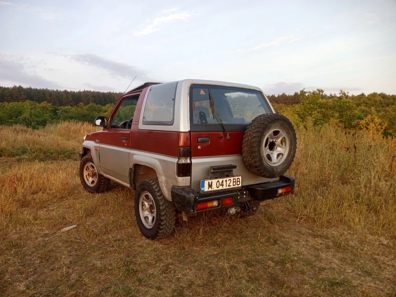 Daihatsu Feroza 1.6 газ/бензин, снимка 14 - Автомобили и джипове - 52823310