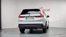 Honda Cr-v 2.0 Hybrid 4WD * DISTR * ПОДГРЕВ * КАМЕРА * ЛЮК | Auto.bg — изображение 4