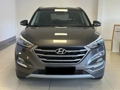 Hyundai Tucson 1, 7GRDI-141k.с/АВТОМАТ/КАМЕРА/КОЖА/НАВИГАЦИЯ/ТОП!, снимка 2 - Автомобили и джипове - 48803638