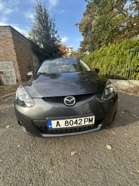 ������ Mazda 2