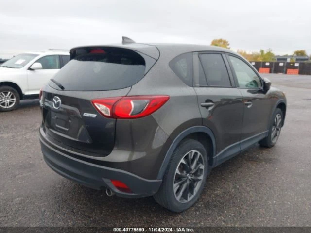 Mazda CX-5 GRAND* TOURING* ПОДГРЕВ* КАМЕРА* ДИСТРОНИК* КЕЙЛЕС, снимка 3 - Автомобили и джипове - 48224701