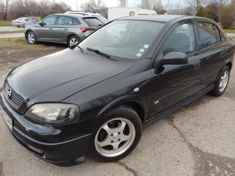 Opel Astra 1.6//КЛИМА///, снимка 12 - Автомобили и джипове - 53329352