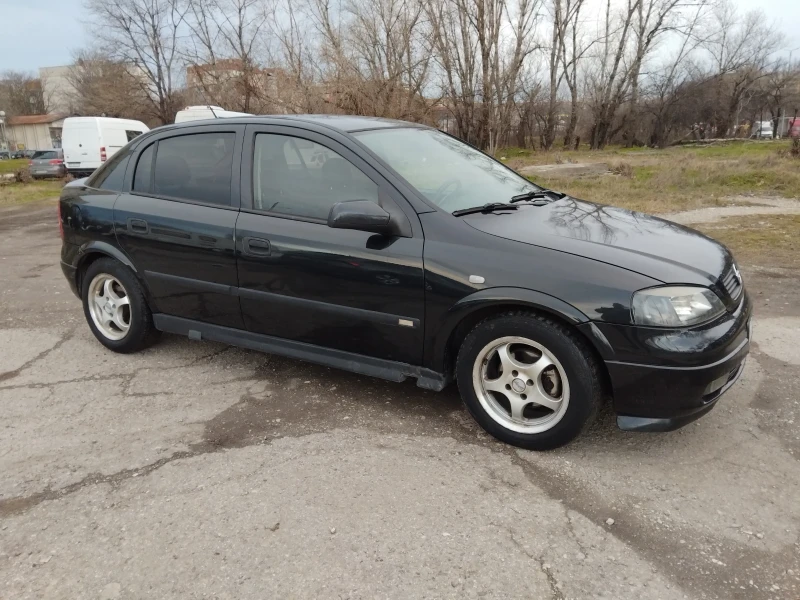 Opel Astra 1.6//КЛИМА///, снимка 9 - Автомобили и джипове - 53329352