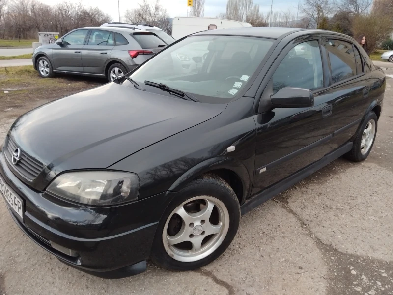 Opel Astra 1.6//КЛИМА///, снимка 15 - Автомобили и джипове - 53329352