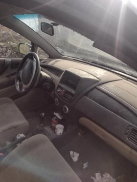 Suzuki Liana 1.6 4x4/Газ/Лети джанти, снимка 14