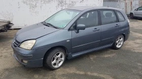 Suzuki Liana 1.6 4x4/Газ/Лети джанти, снимка 11
