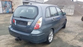 Suzuki Liana 1.6 4x4//  | Mobile.bg    9