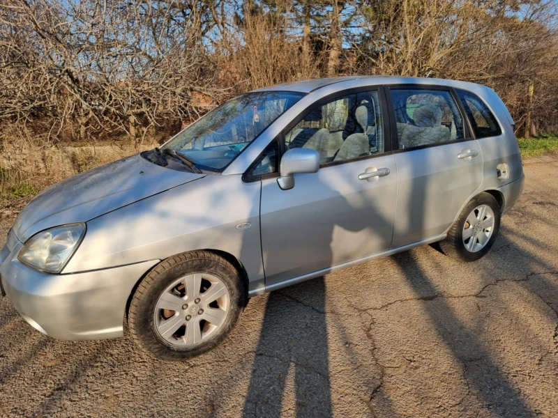 Suzuki Liana 1.6 4x4/Газ/Лети джанти, снимка 2 - Автомобили и джипове - 39840693