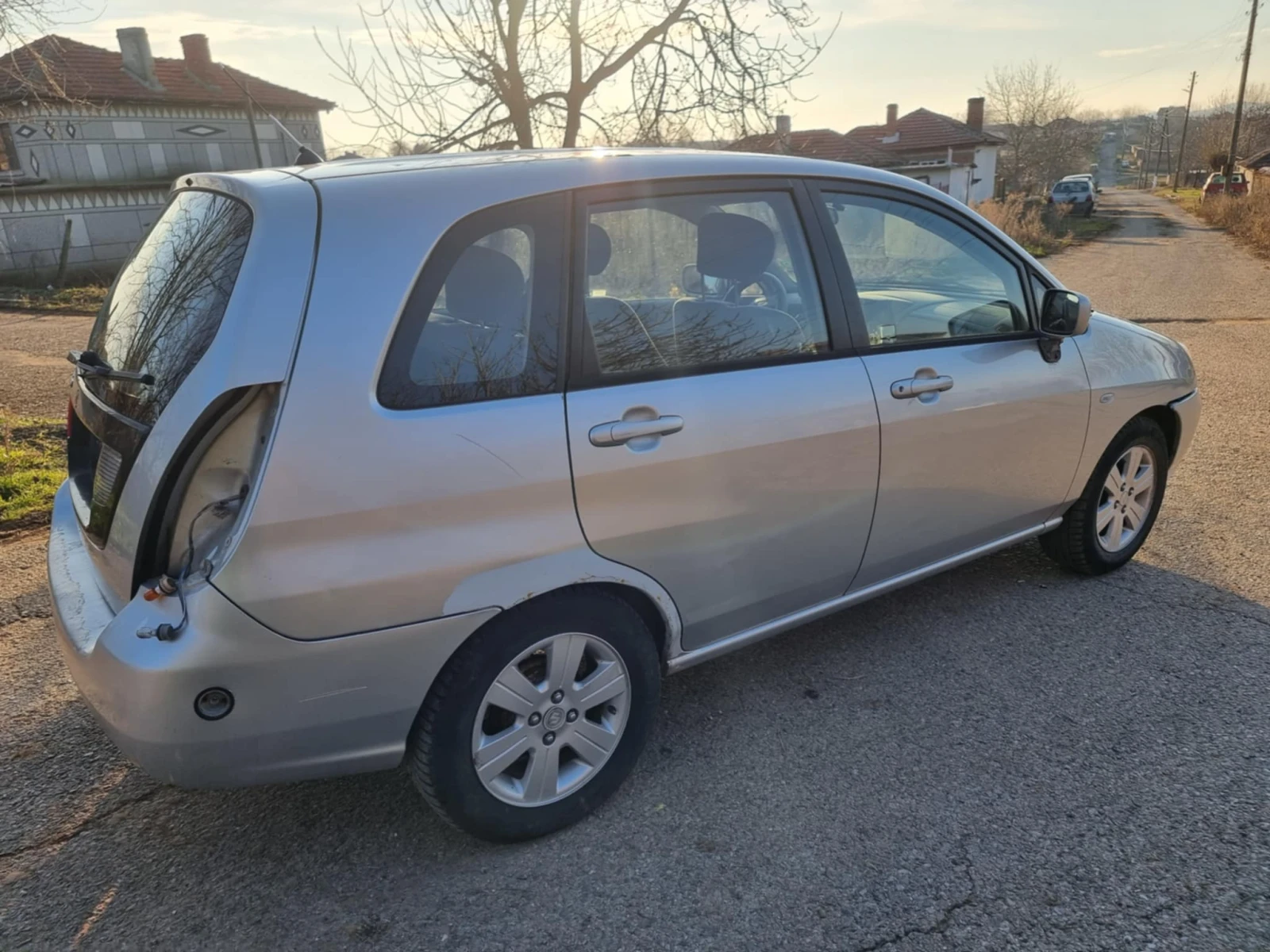 Suzuki Liana 1.6 4x4/Газ/Лети джанти | Mobile.bg — изображение 16