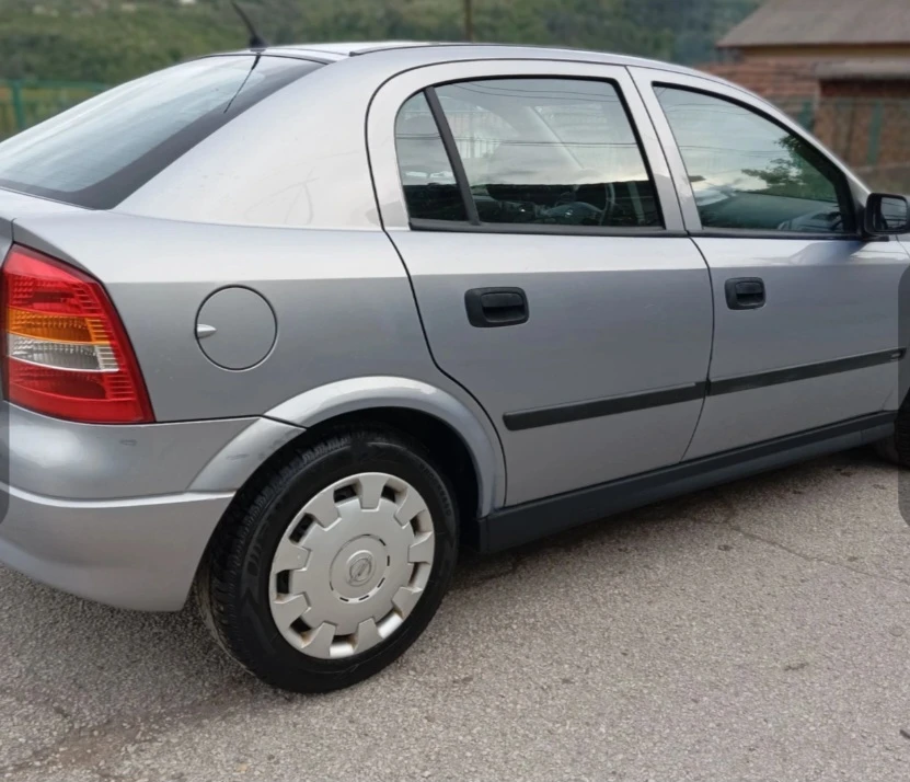 Opel Astra 1.6газ клима , снимка 2 - Автомобили и джипове - 54565384