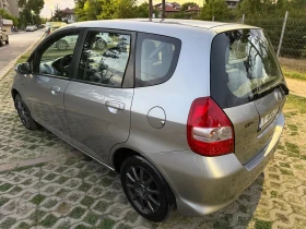     Honda Jazz 1.4 83 . 