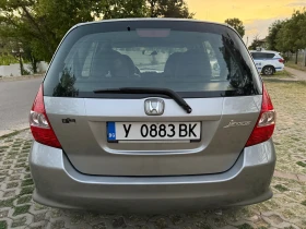     Honda Jazz 1.4 83 . 