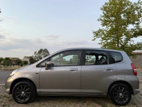     Honda Jazz 1.4 83 . 