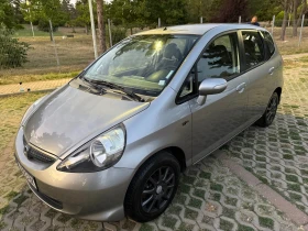     Honda Jazz 1.4 83 . 