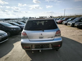 Mitsubishi Outlander 2.4i - 2999 € / 5865.53 лв. - 65861441 5