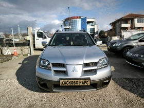 Mitsubishi Outlander 2.4i - 2999 € / 5865.53 лв. - 65861441 2