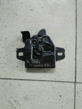 Ключалка (брава) преден капак Гранд Чероки