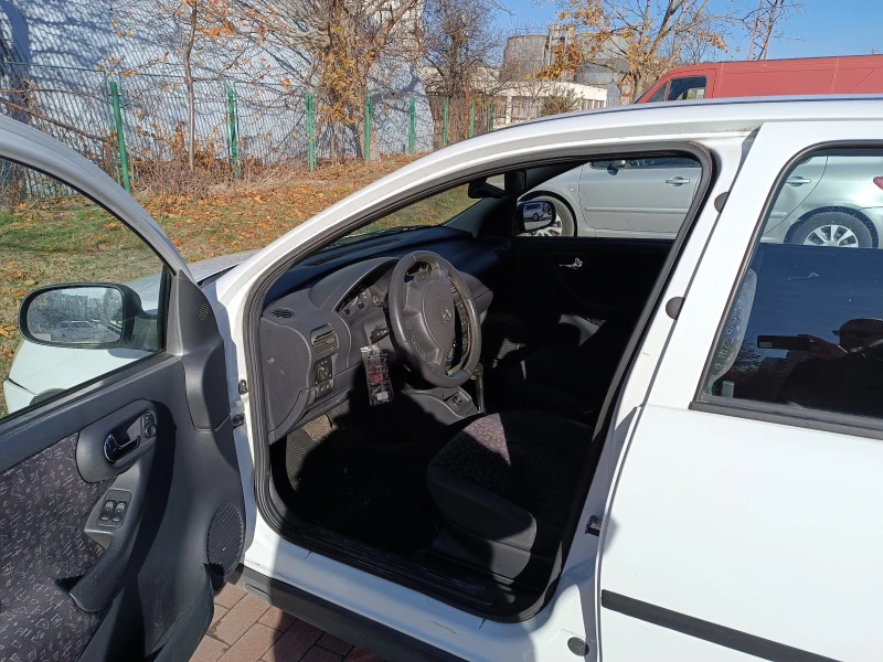 Opel Corsa, снимка 4 - Автомобили и джипове - 49152037