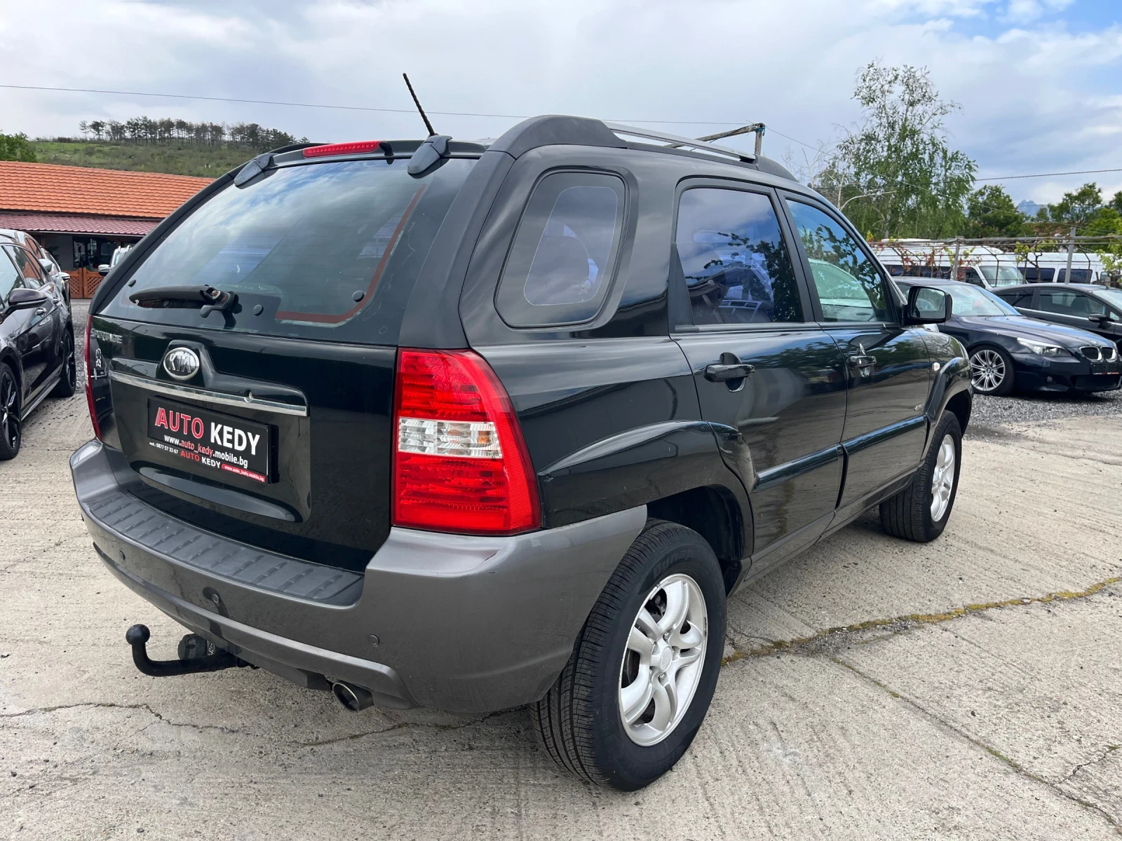 Kia Sportage 2.0i 4WD, снимка 5 - Автомобили и джипове - 54391405