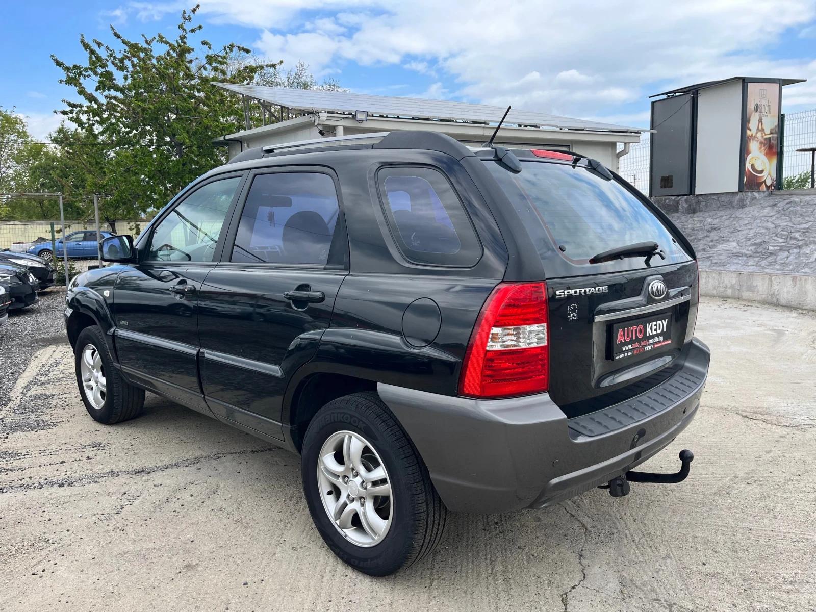 Kia Sportage 2.0i 4WD, снимка 4 - Автомобили и джипове - 54391405