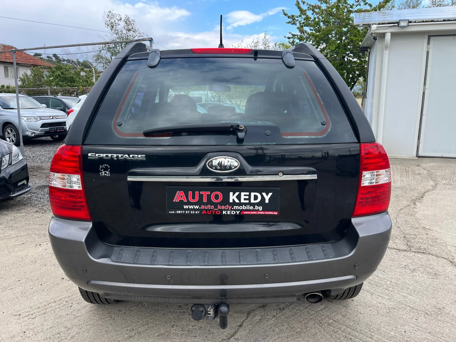 Kia Sportage 2.0i 4WD, снимка 6 - Автомобили и джипове - 54391405